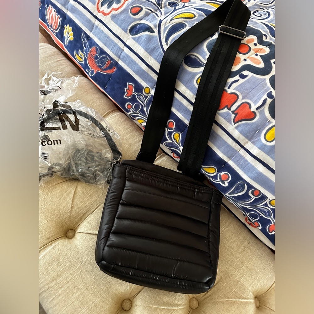 New black Think Roylyn bag.  Never used clean with chain handle included. New